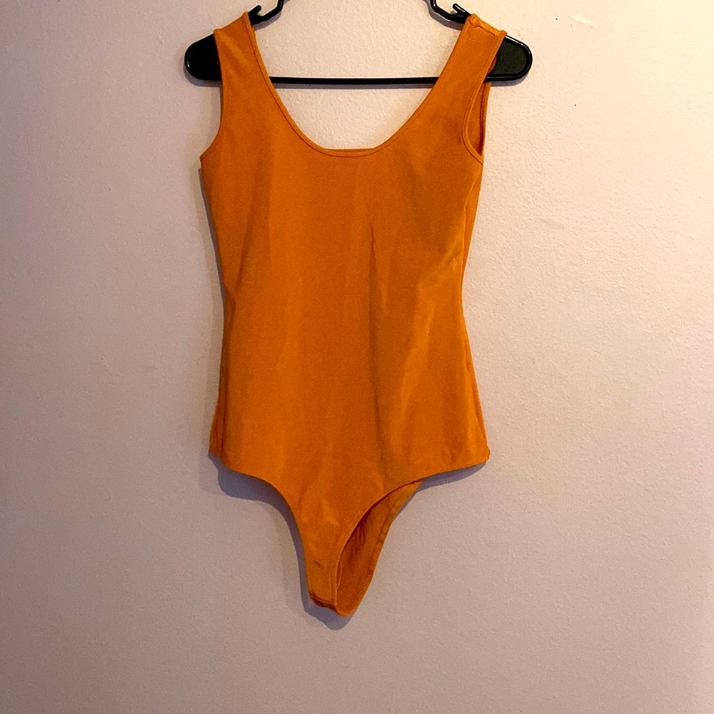 Orange bodysuit